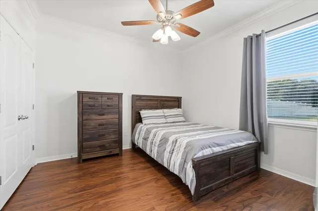 a bathroom with a shower and a sink