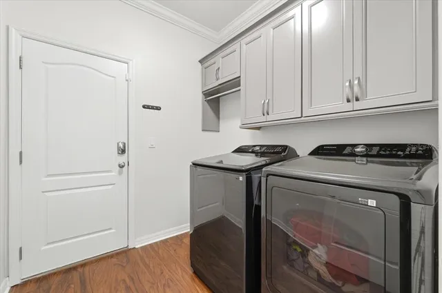 a view of an empty room with a floor to ceiling window and an outdoor kitchen