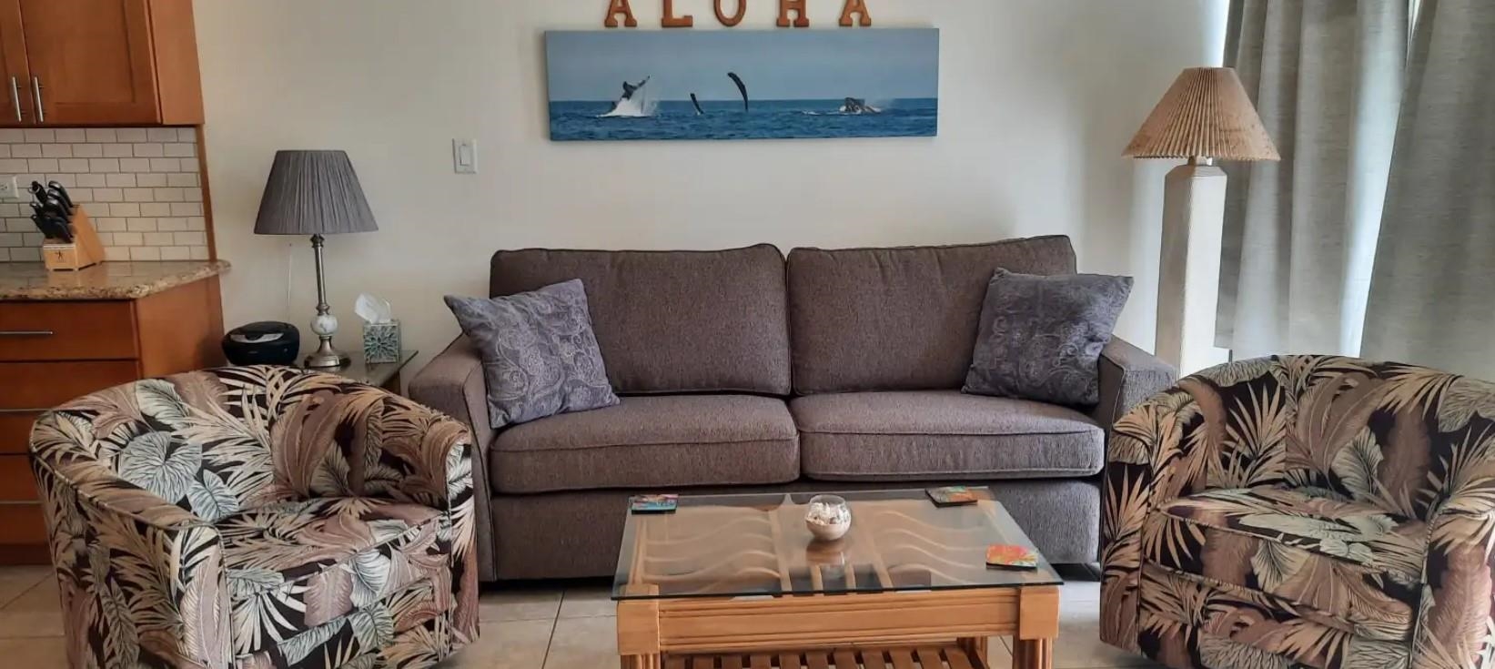 1032 South Kihei Road, Unit A103 Kihei, HI 96753 - Photo 15 of 48 a living room with furniture and a couch