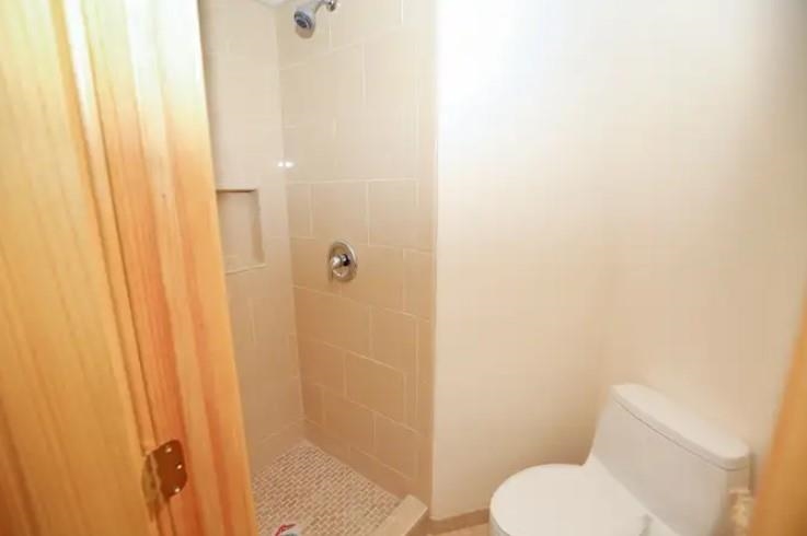 1032 South Kihei Road, Unit A103 Kihei, HI 96753 - Photo 19 of 48 a bathroom with a toilet and a shower