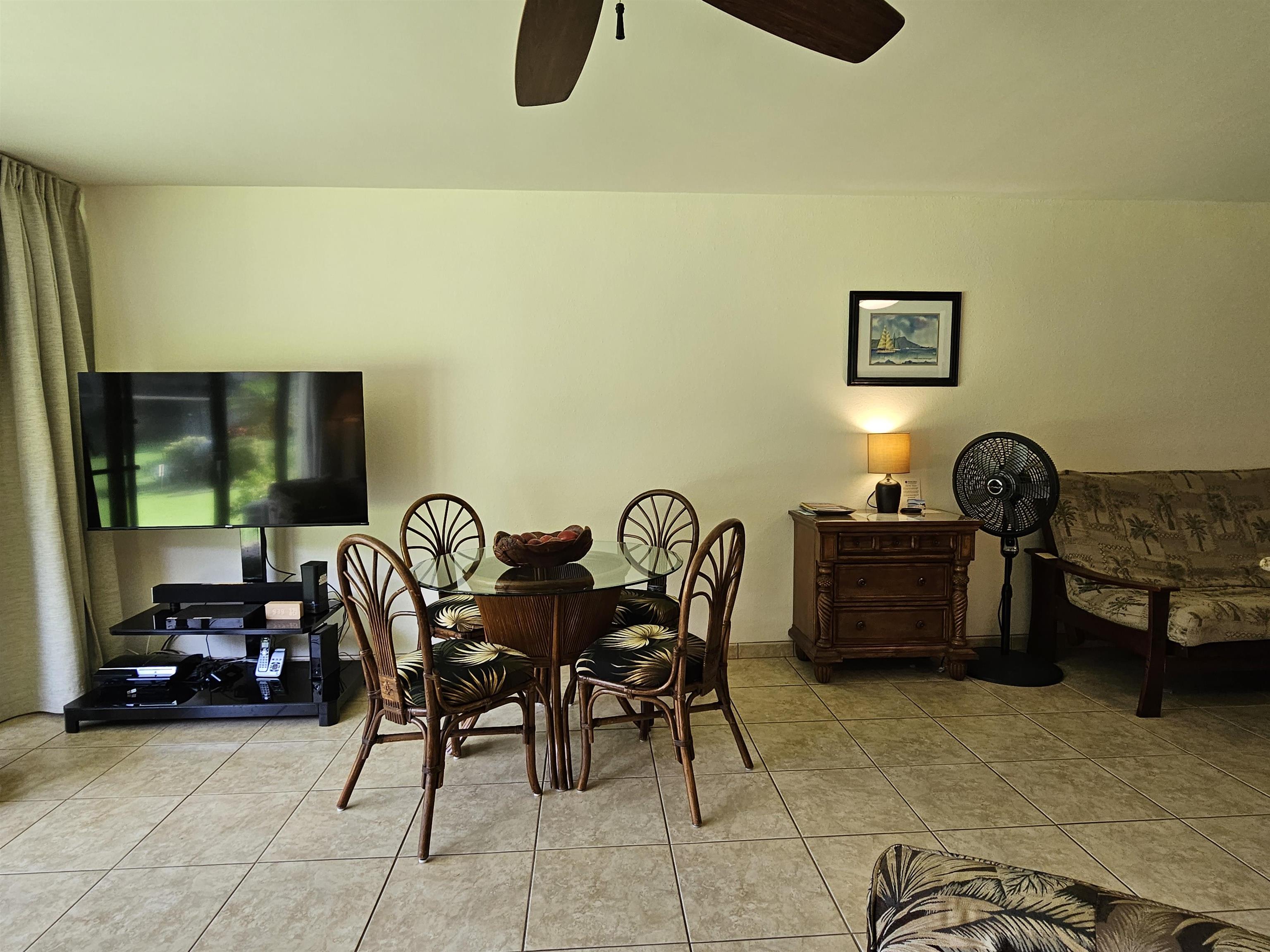 1032 South Kihei Road, Unit A103 Kihei, HI 96753 - Photo 21 of 48 a view of a livingroom with furniture and a couch