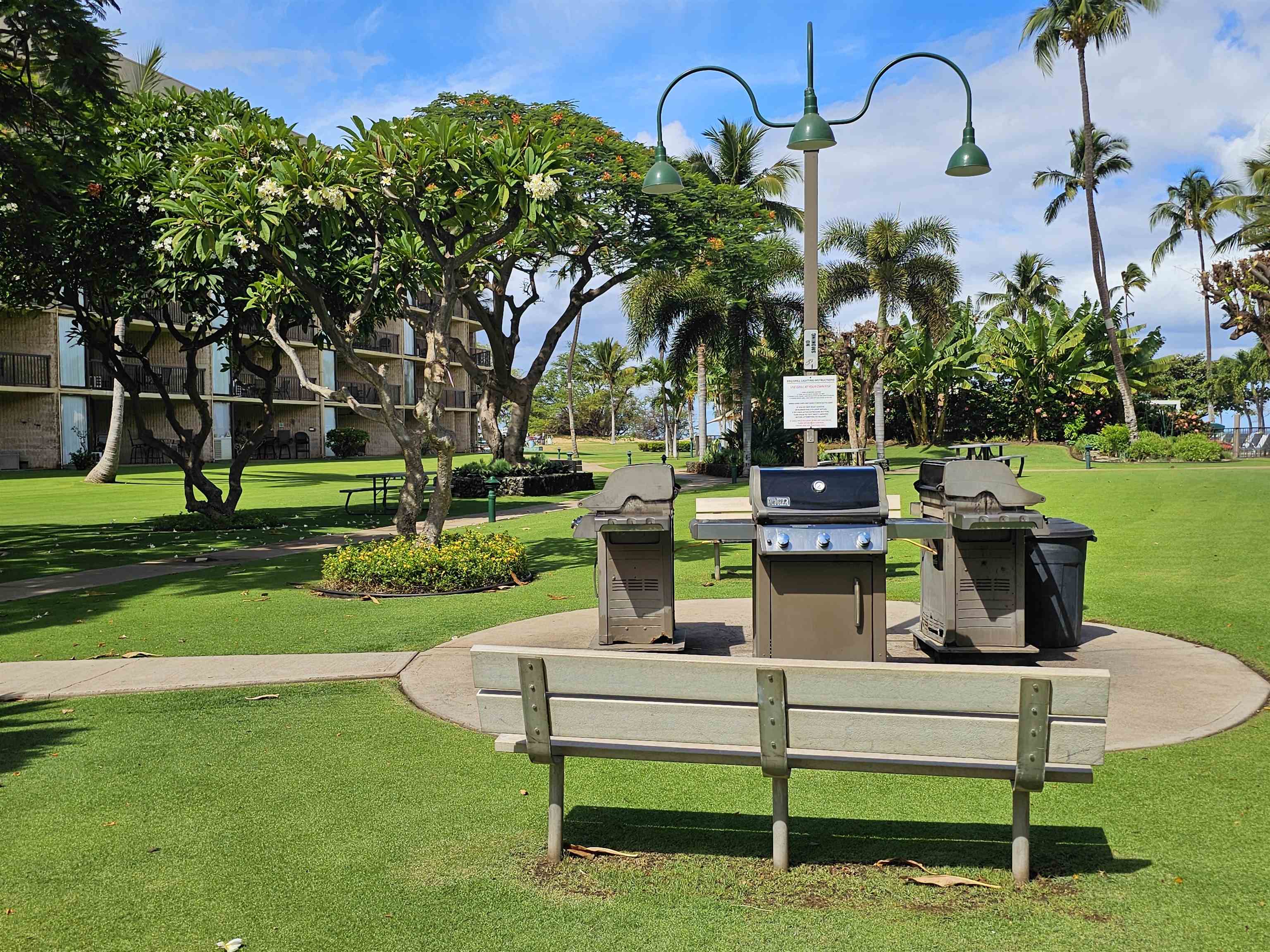 1032 South Kihei Road, Unit A103 Kihei, HI 96753 - Photo 47 of 48 a view of a bench in a park
