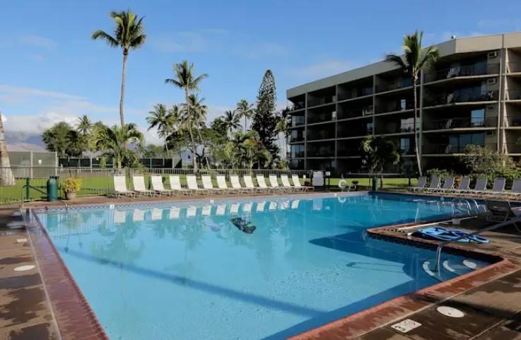 1032 South Kihei Road, Unit A103 Kihei, HI 96753 - Photo 8 of 48 a view of a swimming pool with a patio