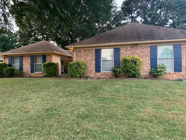 6281 Ridgeline Drive Memphis, TN 38115 - Photo 1 of 1 Single story home with a front lawn