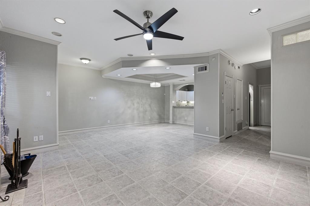 4050 Frankford Road, Unit 804 Dallas, TX 75287 - Photo 6 of 37 a view of an empty room and a ceiling fan