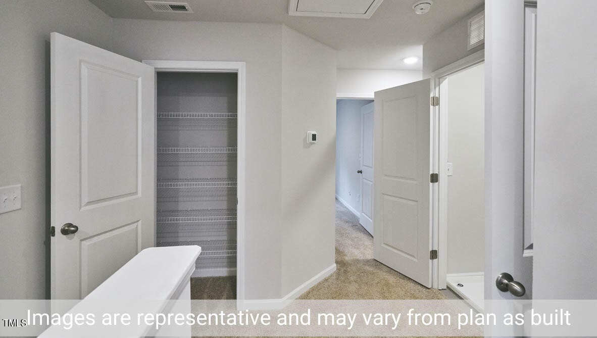 5344 Henley Ridge Drive, Unit 228 Graham, NC 27253 - Photo 30 of 30 a view of bathroom with a toilet