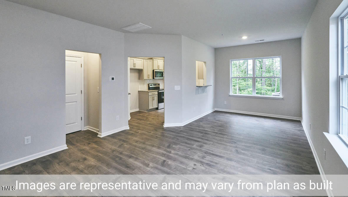5344 Henley Ridge Drive, Unit 228 Graham, NC 27253 - Photo 6 of 30 a view interior of the house and wooden floor
