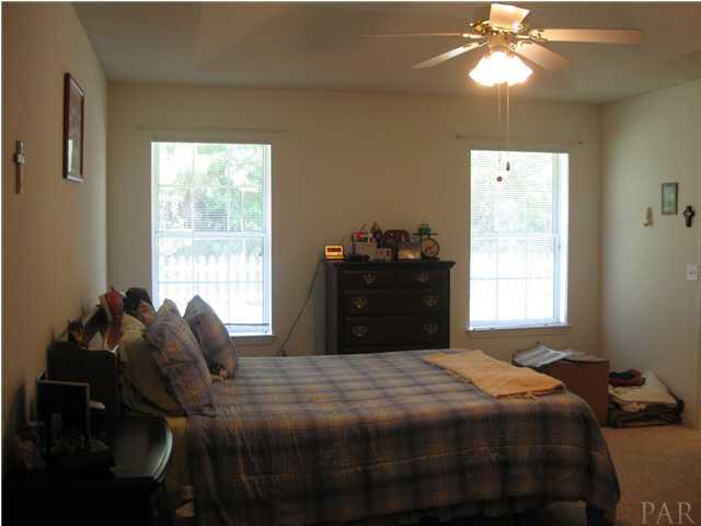 579 Riola Place Pensacola, FL 32506 - Photo 10 of 23 Master bedroom with trey ceiling.