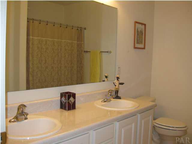 579 Riola Place Pensacola, FL 32506 - Photo 14 of 23 Even the guest bath has double sinks!