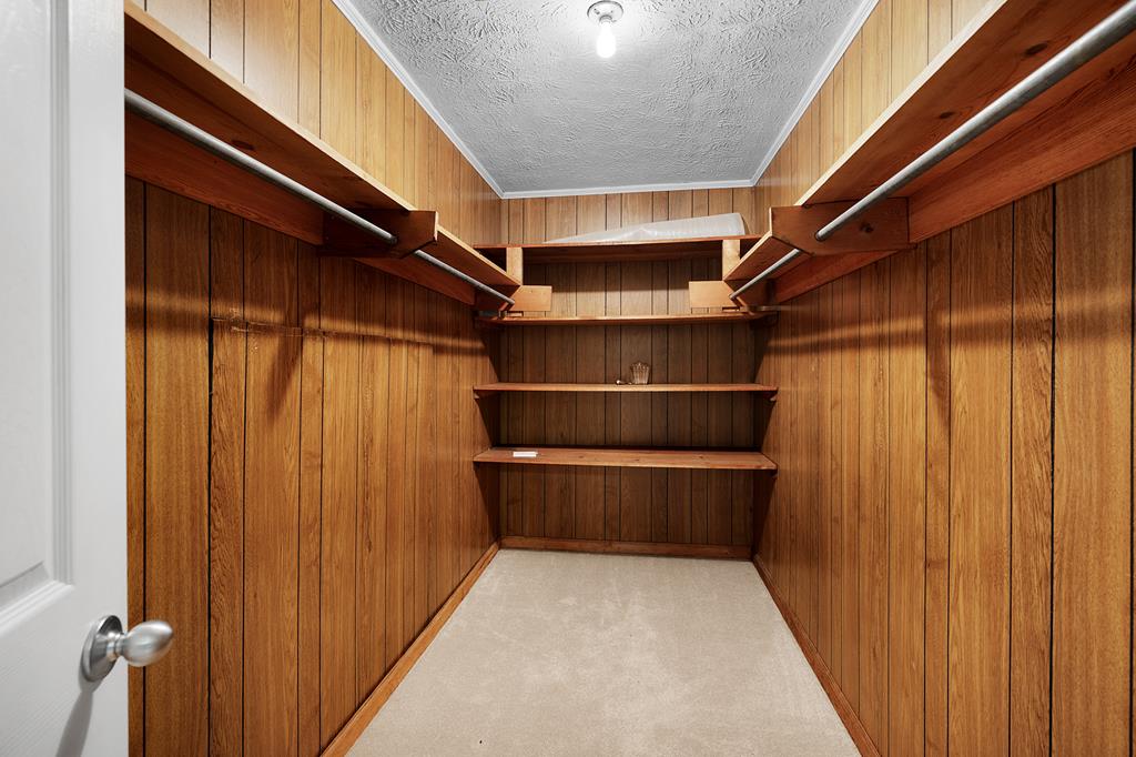 598 Kelso Road Jasper, GA 30143 - Photo 31 of 44 Huge walk in closet on the upper level.