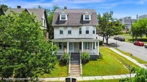 aerial view of a house with swimming pool