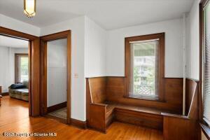 802 Madison Avenue Scranton, PA 18510 - Photo 11 of 52 a view of front door with chair and a potted plant