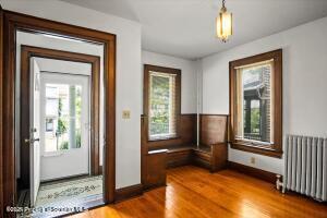 802 Madison Avenue Scranton, PA 18510 - Photo 12 of 52 a view of a livingroom with wooden floor and a window