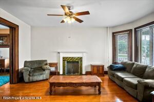 802 Madison Avenue Scranton, PA 18510 - Photo 13 of 52 a bedroom with a bed couch and window