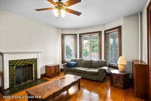 802 Madison Avenue Scranton, PA 18510 - Photo 14 of 52 a living room with furniture and a fireplace
