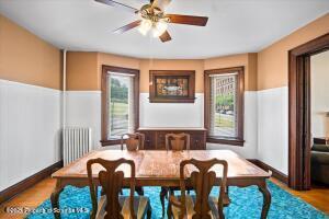 802 Madison Avenue Scranton, PA 18510 - Photo 19 of 52 a view of a dining room with furniture window and wooden floor