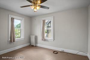 802 Madison Avenue Scranton, PA 18510 - Photo 28 of 52 an empty room with windows and fan