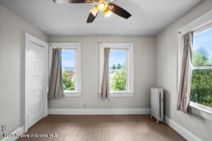 802 Madison Avenue Scranton, PA 18510 - Photo 29 of 52 a view of room with hardwood floor and window