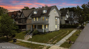 802 Madison Avenue Scranton, PA 18510 - Photo 3 of 52 a front view of a house with a yard