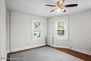 802 Madison Avenue Scranton, PA 18510 - Photo 34 of 52 an empty room with windows and fan