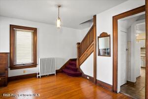 802 Madison Avenue Scranton, PA 18510 - Photo 9 of 52 a view of a livingroom with entryway and stairs