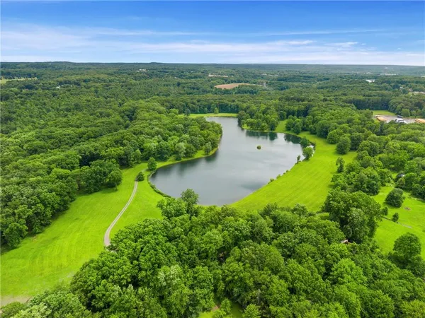 a view of a lake with a outdoor space