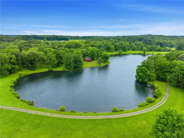 a view of a lake with a big yard
