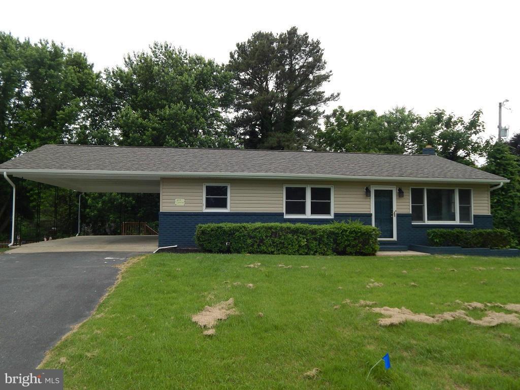 111 Calvert Towne Road Prince Frederick, MD 20678 - Photo 2 of 26 a front view of a house with a garden