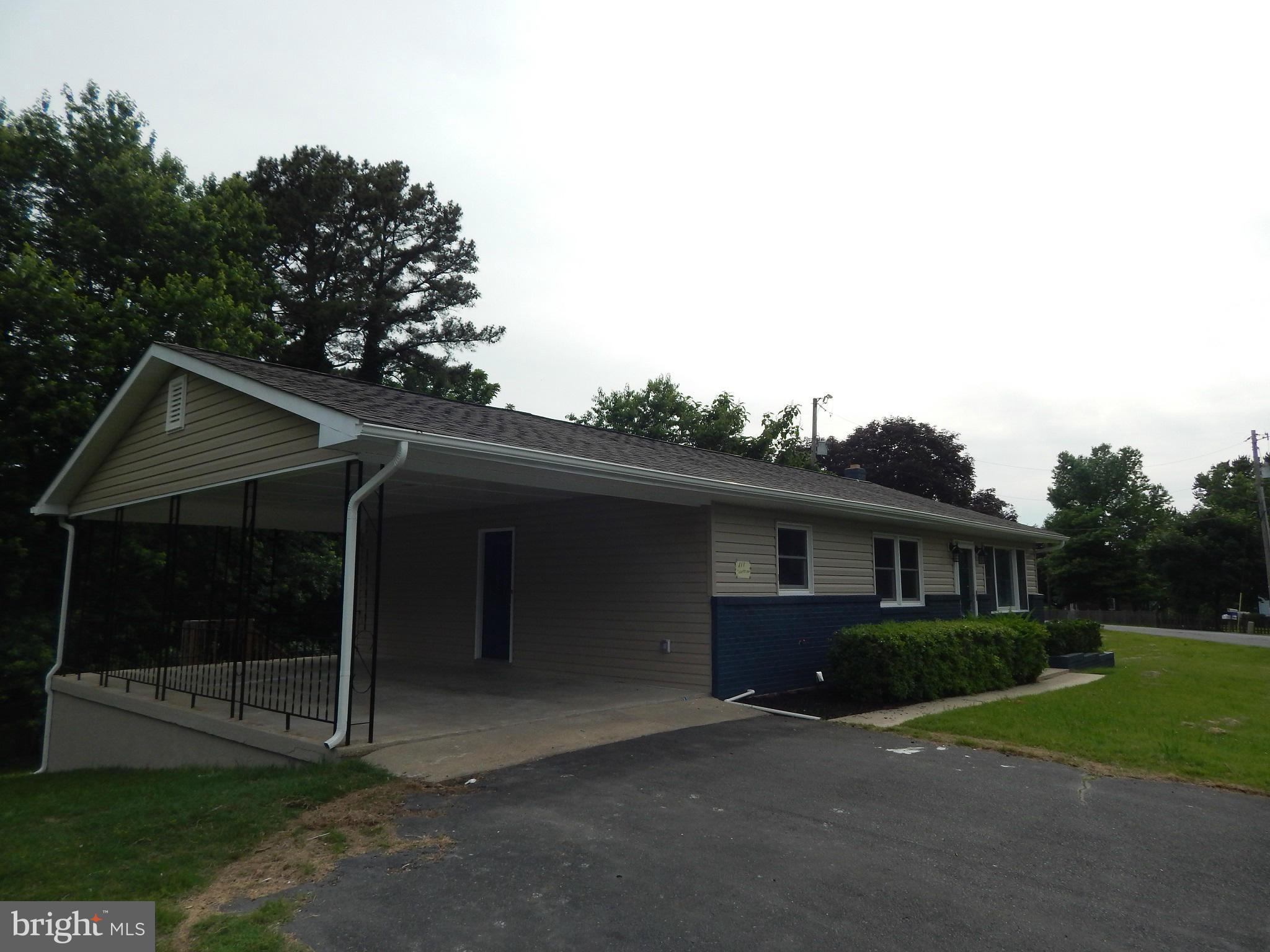 111 Calvert Towne Road Prince Frederick, MD 20678 - Photo 26 of 26 a front view of house with yard and green space