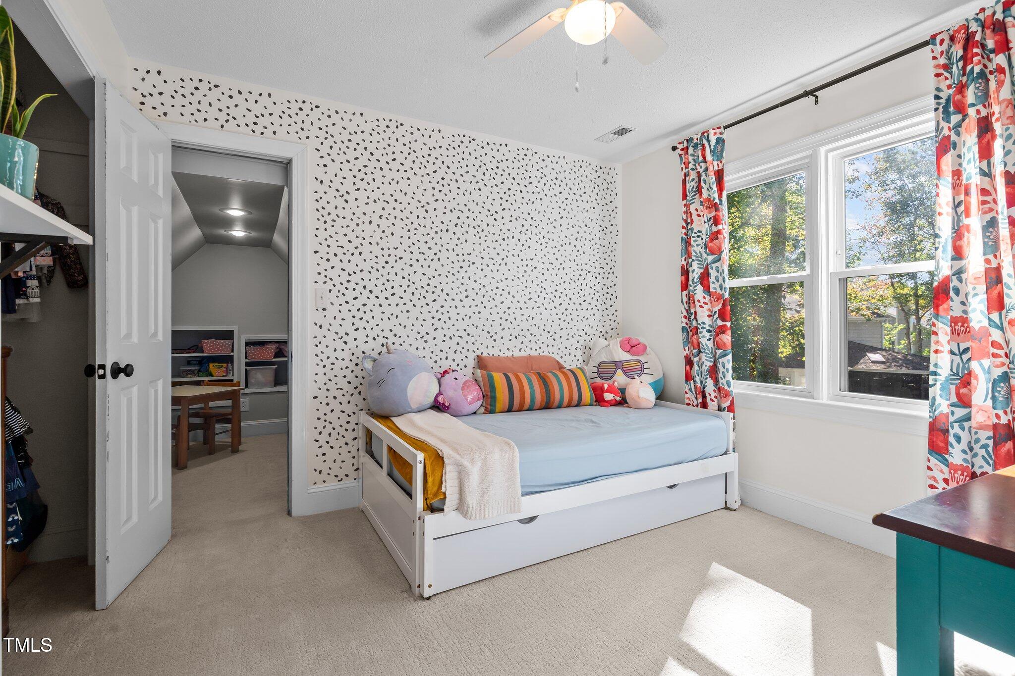 2916 Bolo Trail Raleigh, NC 27615 - Photo 18 of 43 a bedroom with a bed and a window