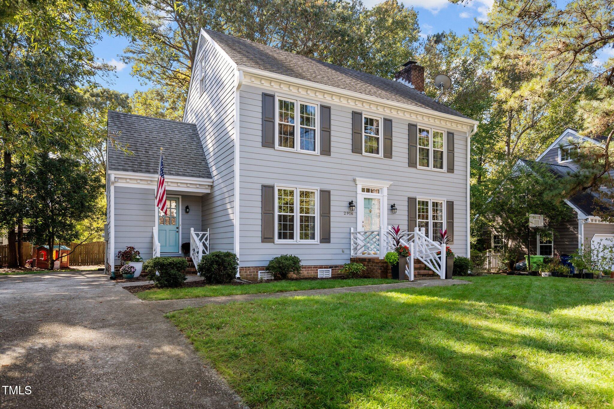 2916 Bolo Trail Raleigh, NC 27615 - Photo 2 of 43 a front view of a house with a yard