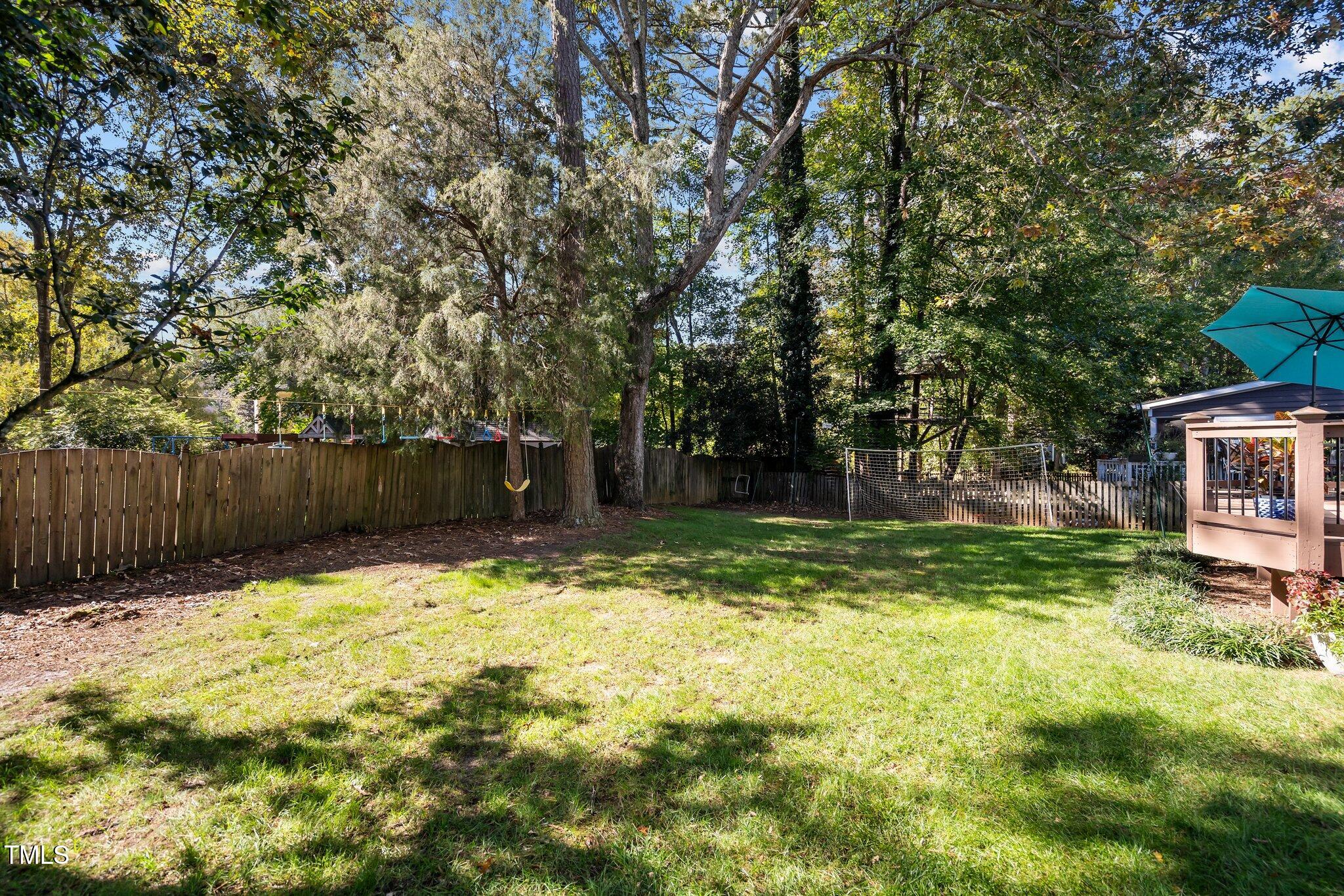 2916 Bolo Trail Raleigh, NC 27615 - Photo 34 of 43 a view of backyard with tree