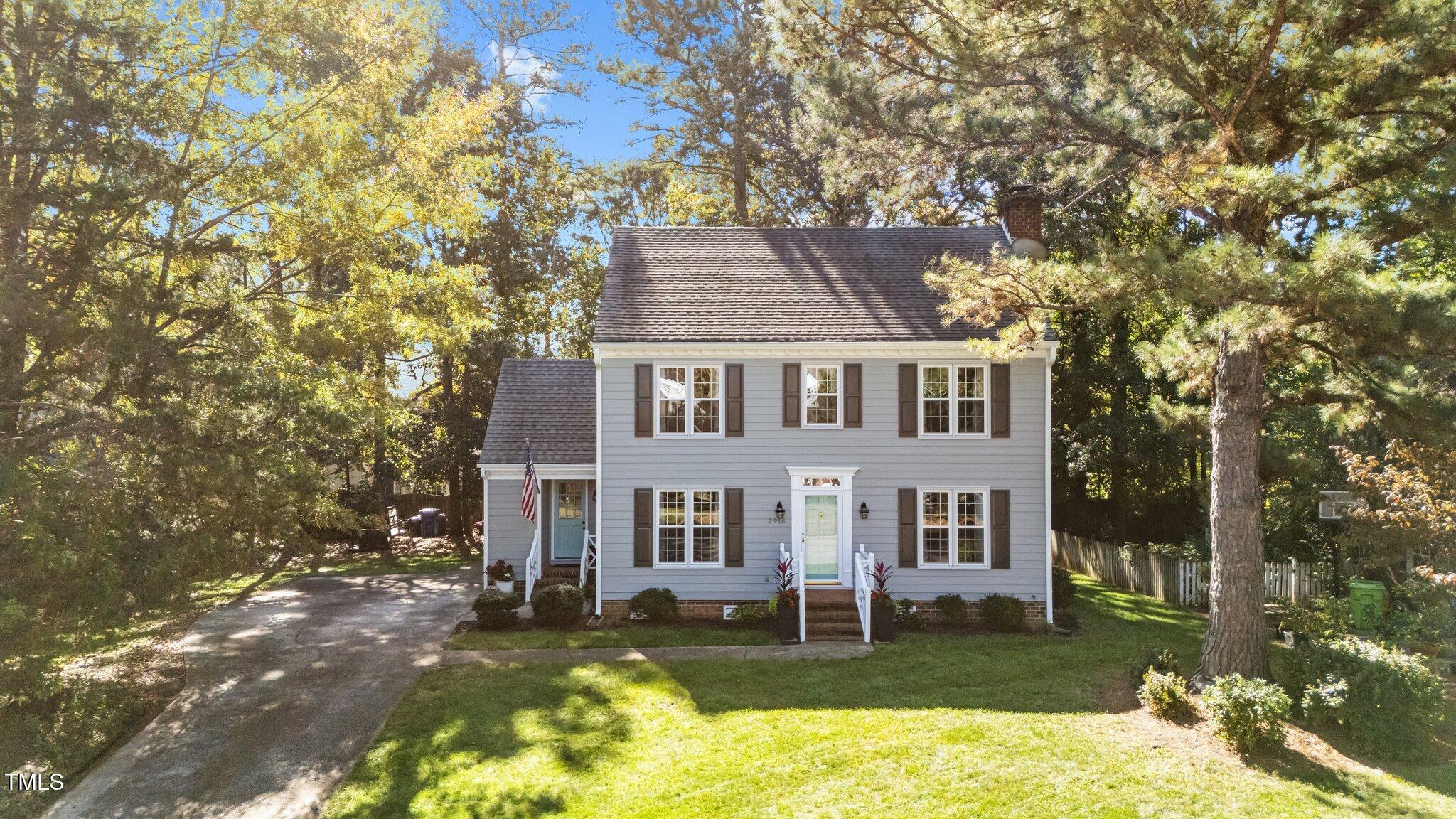 2916 Bolo Trail Raleigh, NC 27615 - Photo 42 of 43 front view of a house with a yard