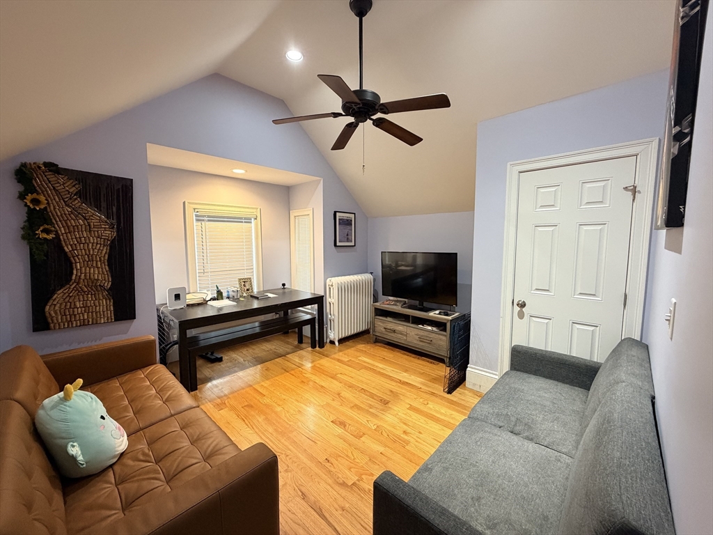 341 Linwood Avenue, Unit 2 Newton, MA 02460 - Photo 1 of 18 a living room with furniture and a flat screen tv