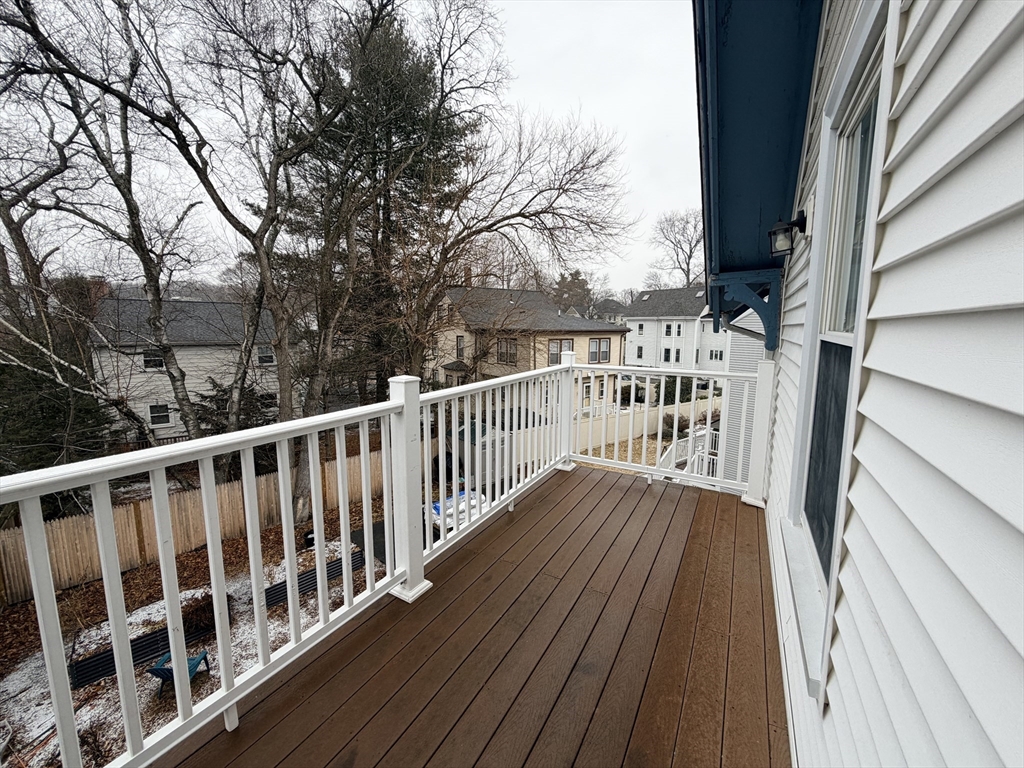 341 Linwood Avenue, Unit 2 Newton, MA 02460 - Photo 13 of 18 a view of balcony with wooden floor