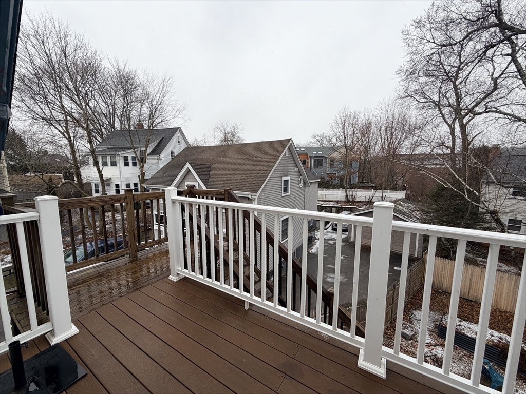 341 Linwood Avenue, Unit 2 Newton, MA 02460 - Photo 14 of 18 a view of a house with wooden deck