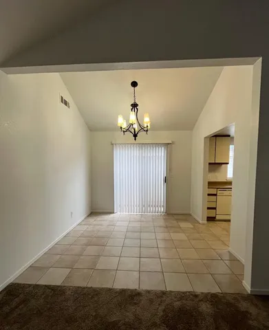 a view of room with racks on the wall