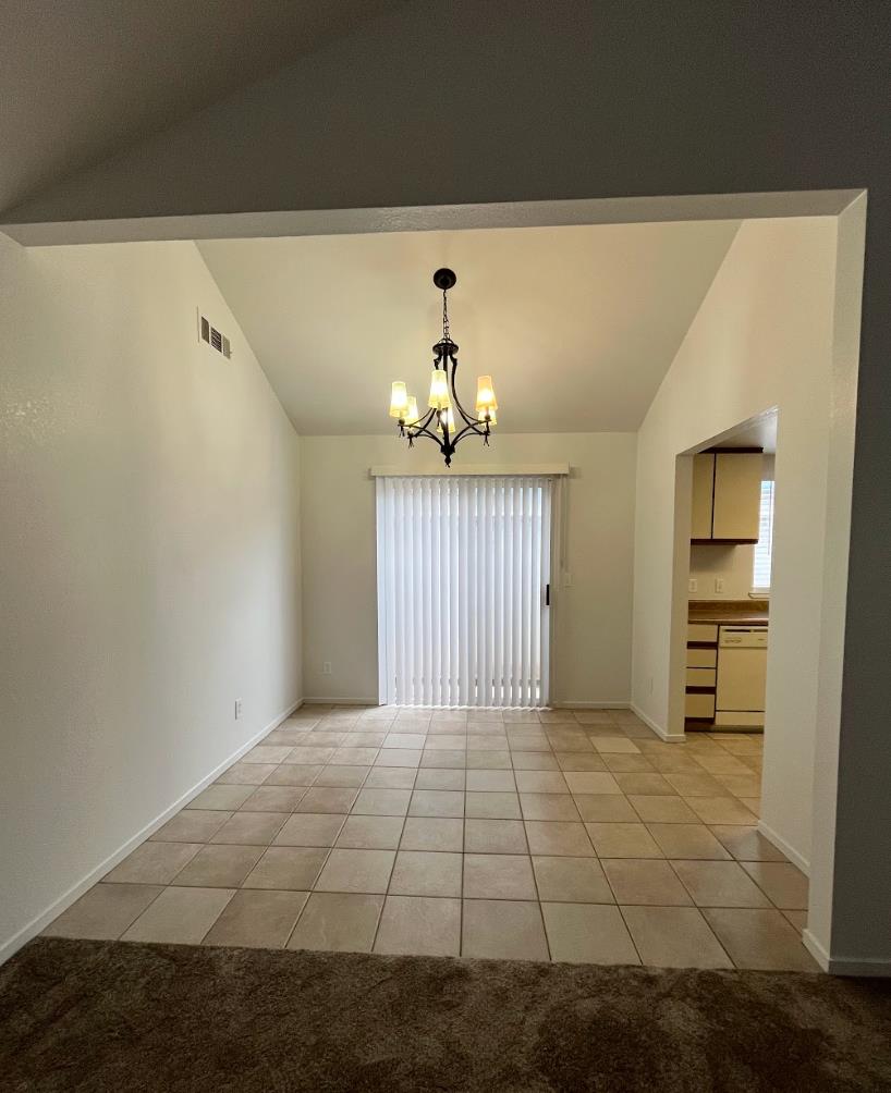 210 Tim Bell Road Waterford, CA 95386 - Photo 7 of 15 Spacious dining to side yard though slider.