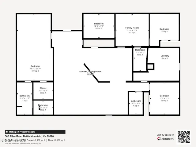 a living room with furniture a flat screen tv and a window
