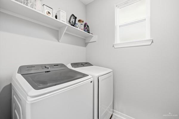 14126 Wichita Falls Lane McAllen, TX 78504 - Photo 12 of 14 a utility room with dryer and washer