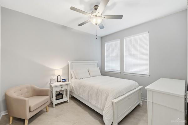 14126 Wichita Falls Lane McAllen, TX 78504 - Photo 7 of 14 a bedroom with a bed and a couch