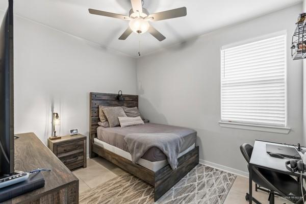 14126 Wichita Falls Lane McAllen, TX 78504 - Photo 8 of 14 a bedroom with a bed and a window