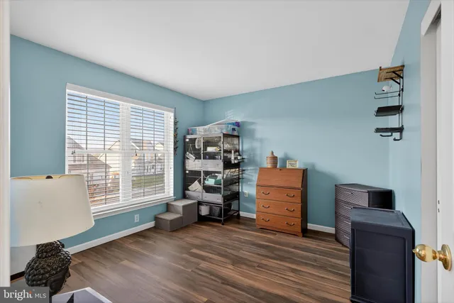 a room with furniture and a window