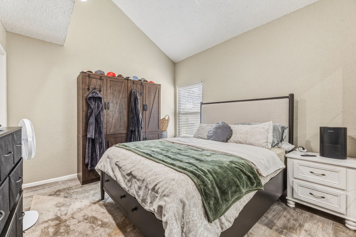 12900 Walden Road, Unit 312C Montgomery, TX 77356 - Photo 5 of 26 Primary bedroom on main floor with ensuite bathroom