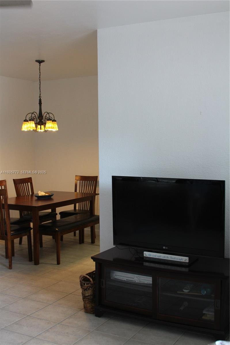 1300 North Ocean Boulevard, Unit 111 Pompano Beach, FL 33062 - Photo 19 of 26 a view of dining room with furniture