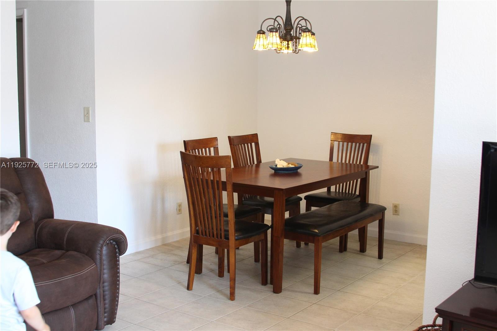 1300 North Ocean Boulevard, Unit 111 Pompano Beach, FL 33062 - Photo 24 of 26 a view of a dining room with furniture