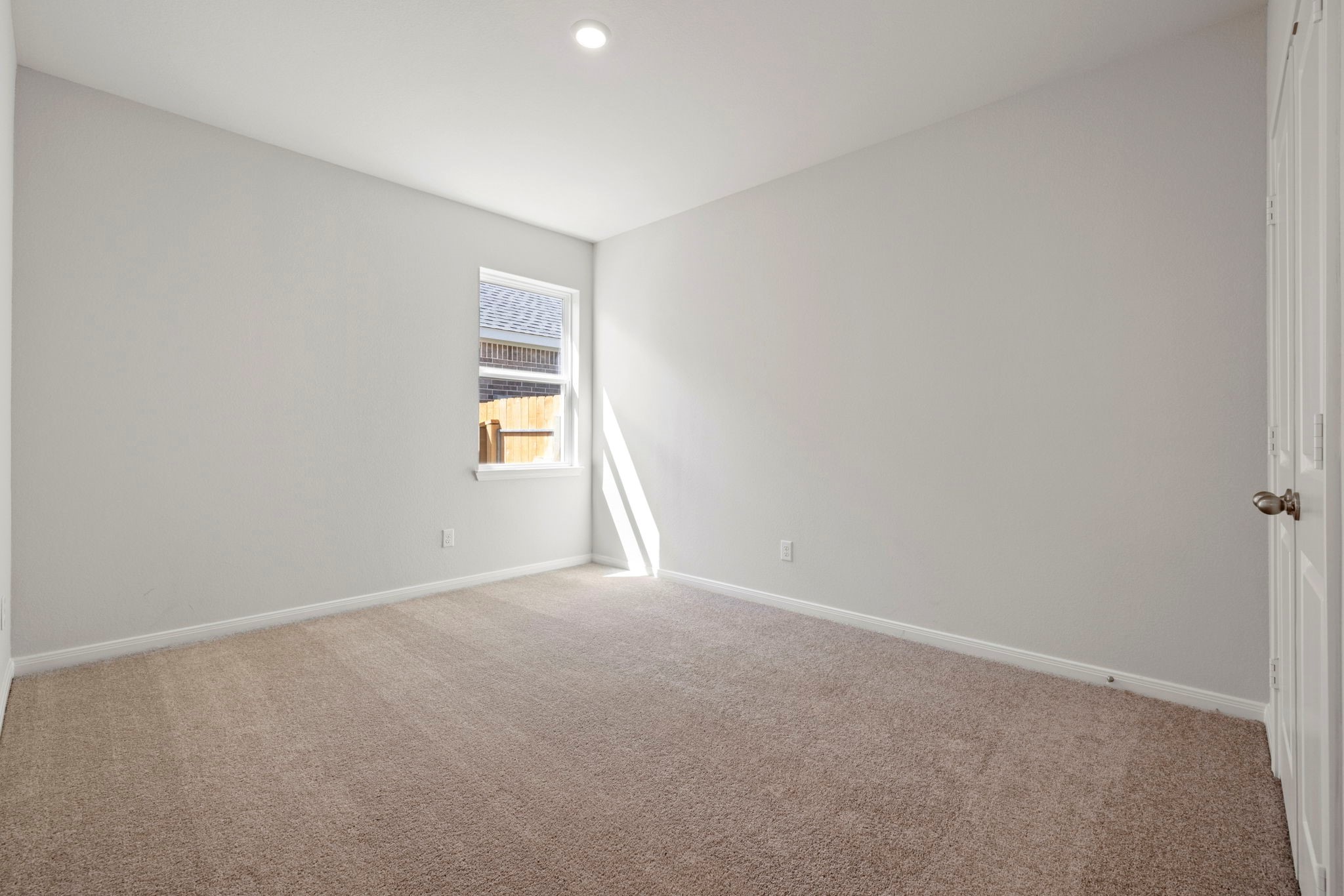 7506 Tipton Meadow Way Richmond, TX 77469 - Photo 15 of 21 a view of an empty room with a window
