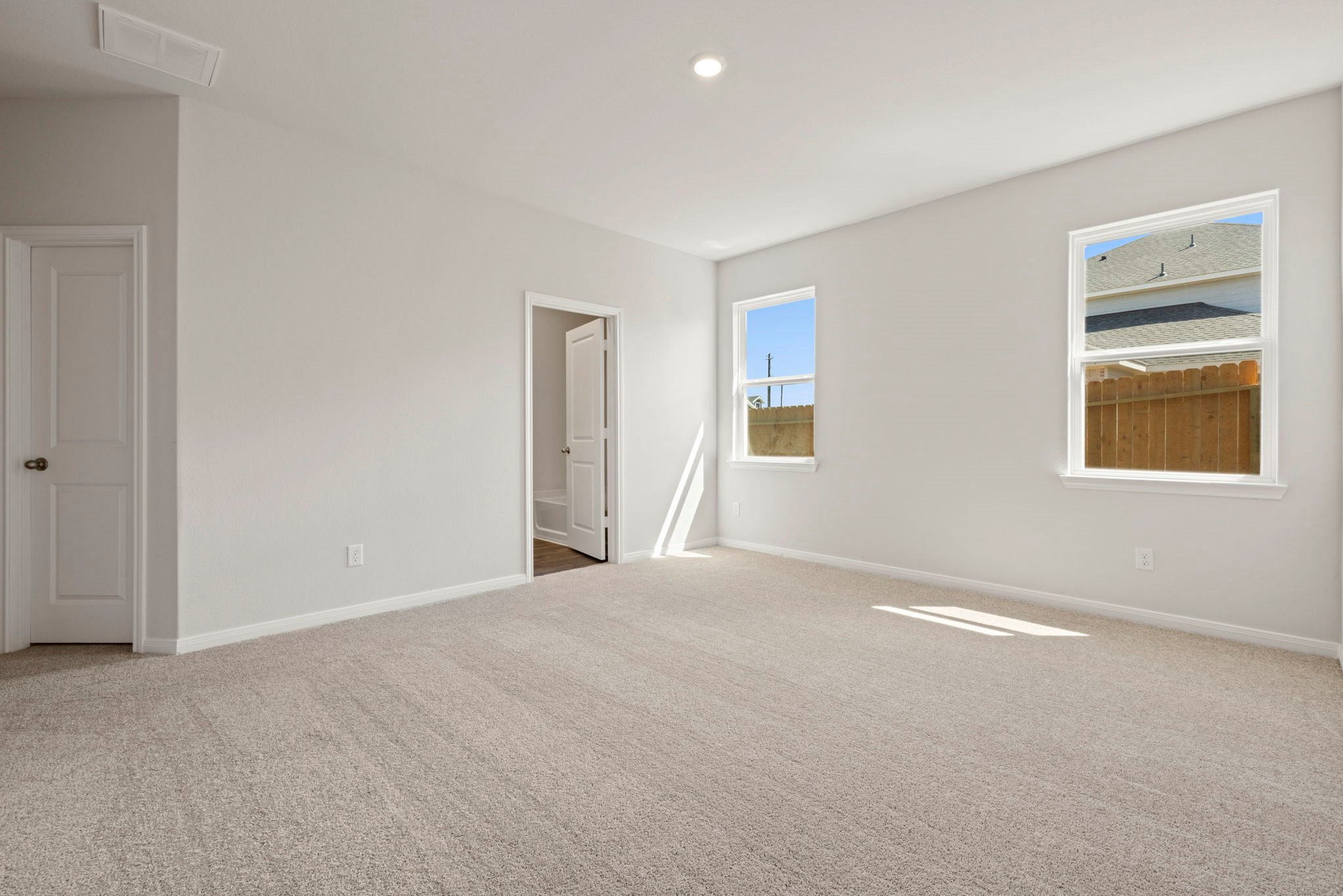 7506 Tipton Meadow Way Richmond, TX 77469 - Photo 17 of 21 a view of an empty room with a window