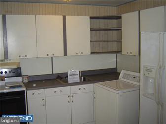 40 Jollybrook Road Levittown, PA 19056 - Photo 4 of 6 a kitchen with appliances cabinets and a counter top space
