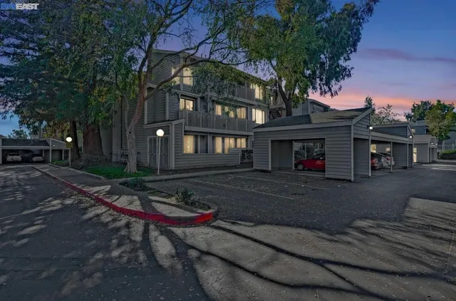 a front view of a house with yard